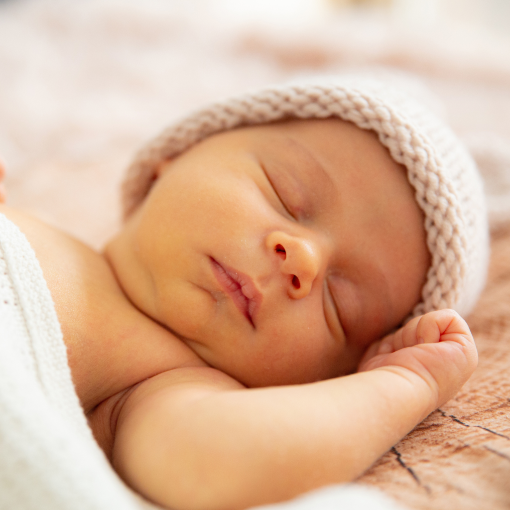 Sleeping new born baby for how to save money on baby