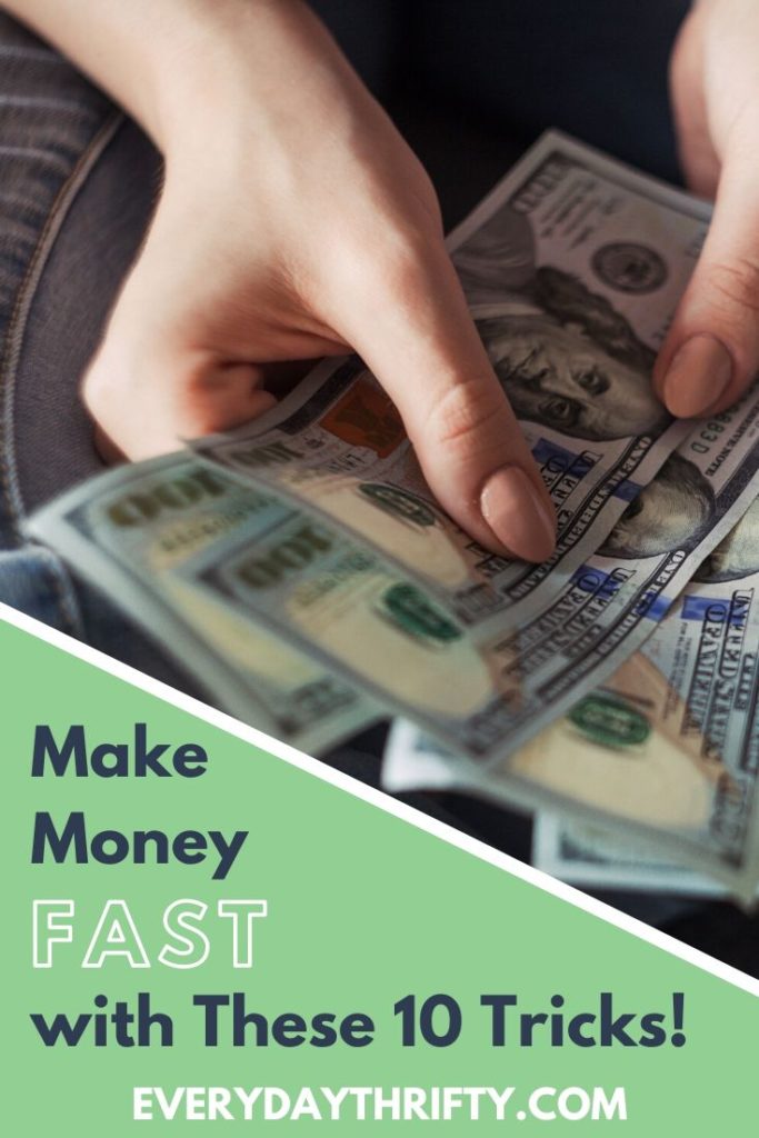make money fast promo graphic featuring a hand holding hundred dollar bills