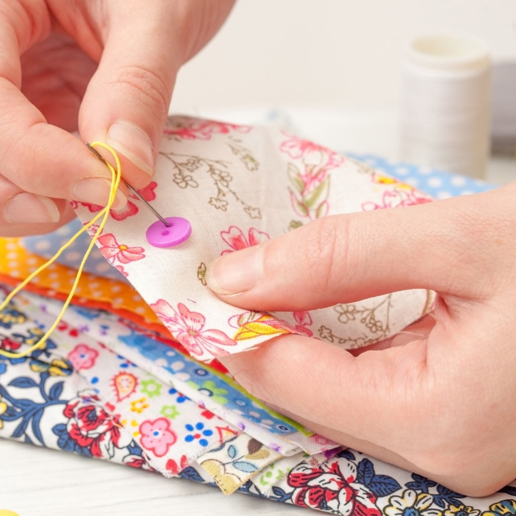 Person sewing a piece of fabric for money mistakes to avoid
