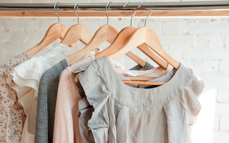 minimalist clothing pieces hanging in closet for organizational hobbies 