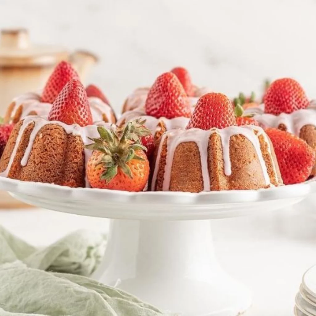 mini strawberry bundt cakes on white tray