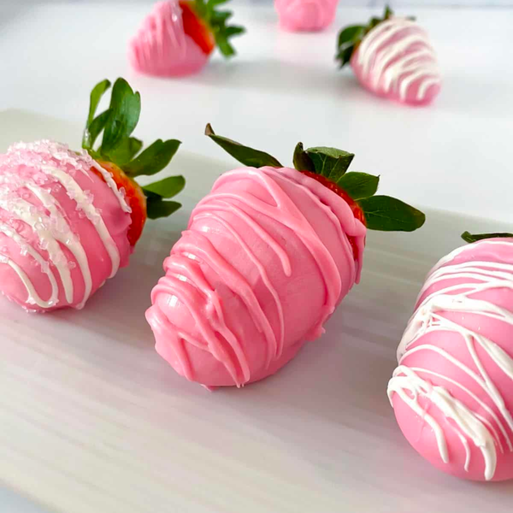 pink chocolate covered strawberries for baby shower food ideas on a budget