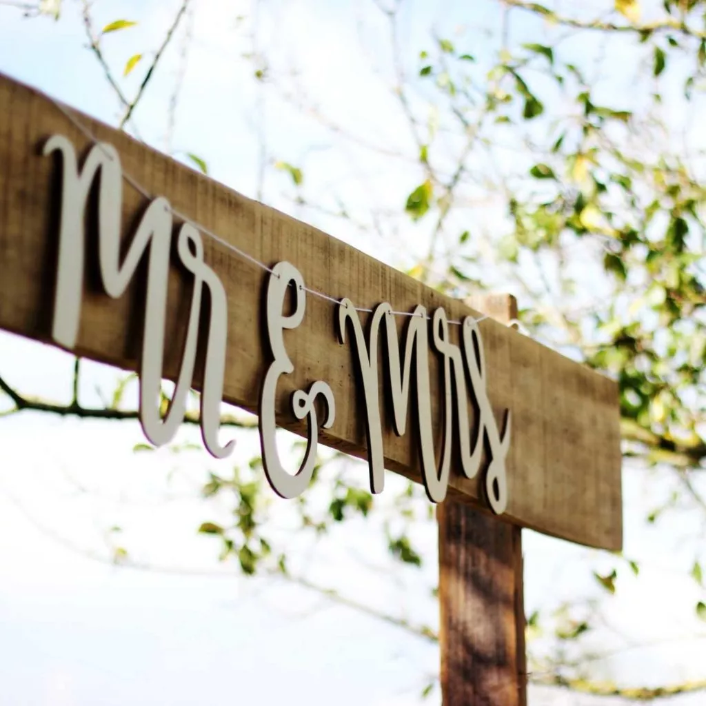 Build a DIY wooden sign to go with your other fall wedding decor.