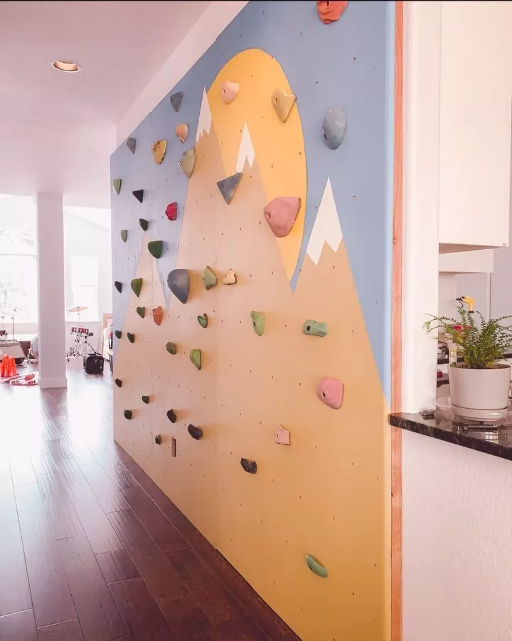 Add a rock climbing wall into your house for a great budget DIY playroom feature. 