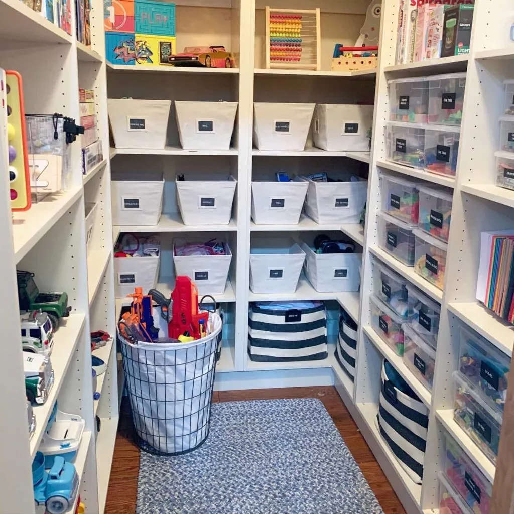 A walk in closet makes a fantastic playroom because there is space for storage and play that is all contained in one space. 