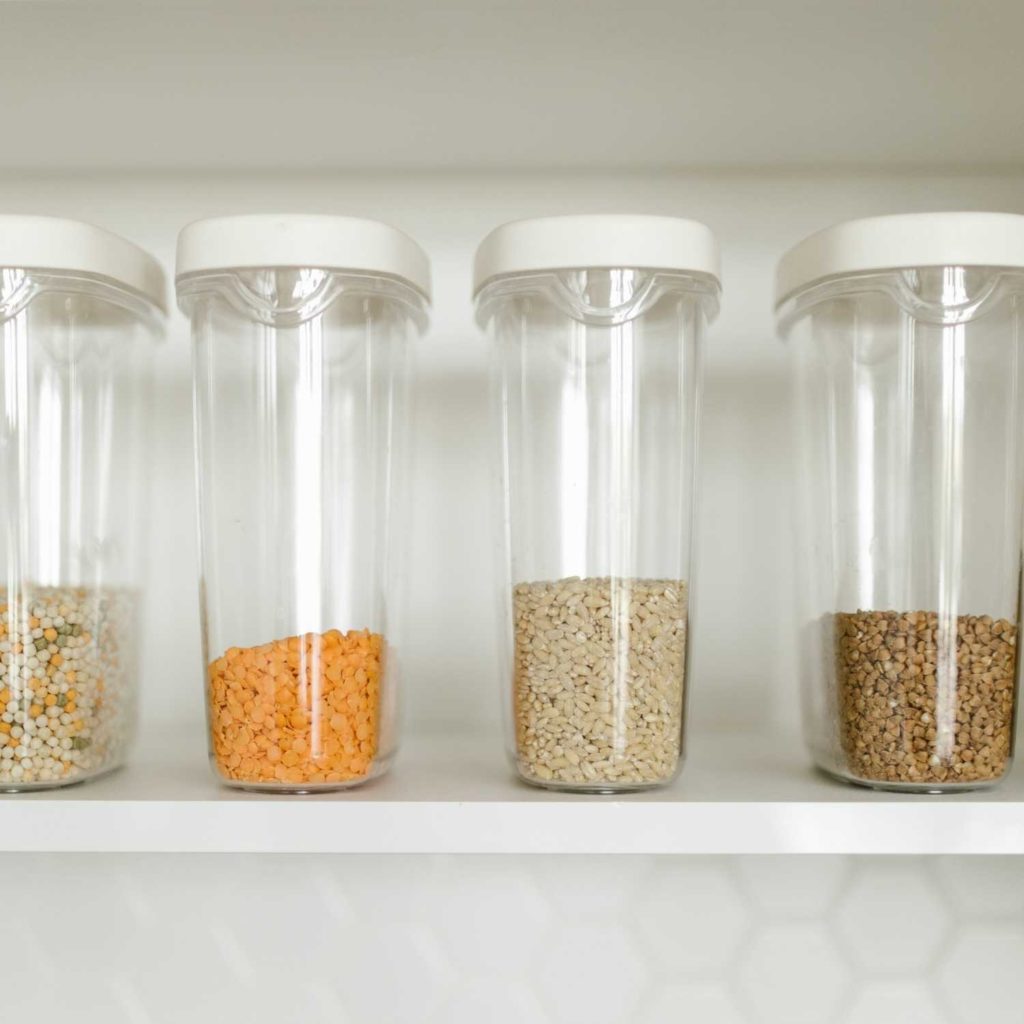 Use clear plastic storage containers to help you get organized. 