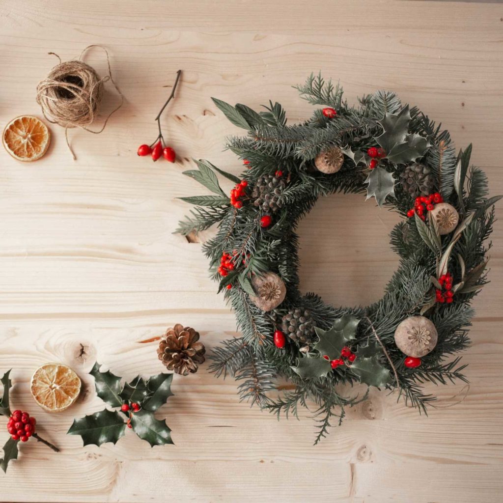 Make a DIY Christmas wreath to save some money on your decor when looking for ideas for cheap Christmas decorations.
