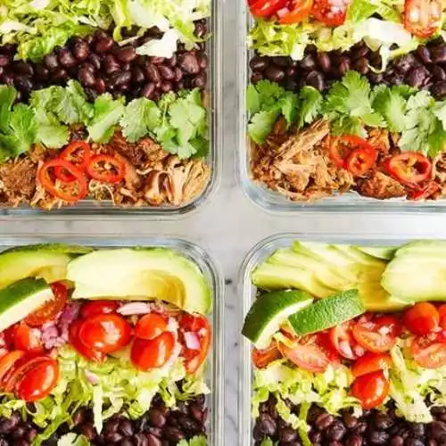 Burrito bowls that you can make ahead of time with your slow cooker. 