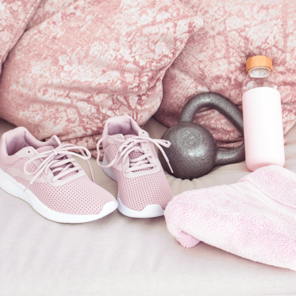 Pink workout items for ways to set up a minimalist home gym.