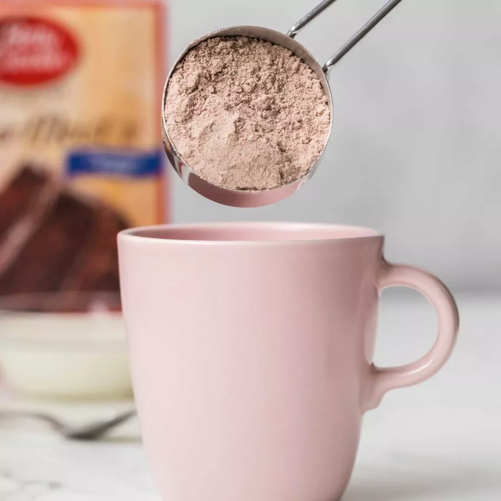 Add cake mix to your 12 oz mug.