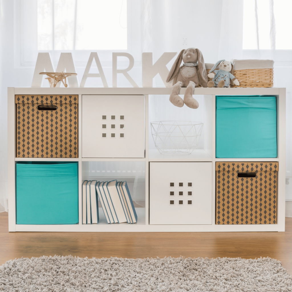 Cube stands are versatile storage when looking for baby room ideas on a budget. 