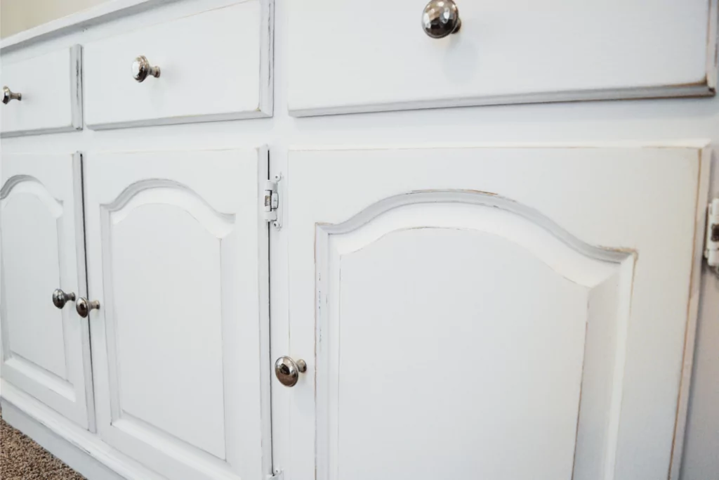 Repurpose old furniture for baby room ideas on a budget. Antique white dresser for baby's room. 